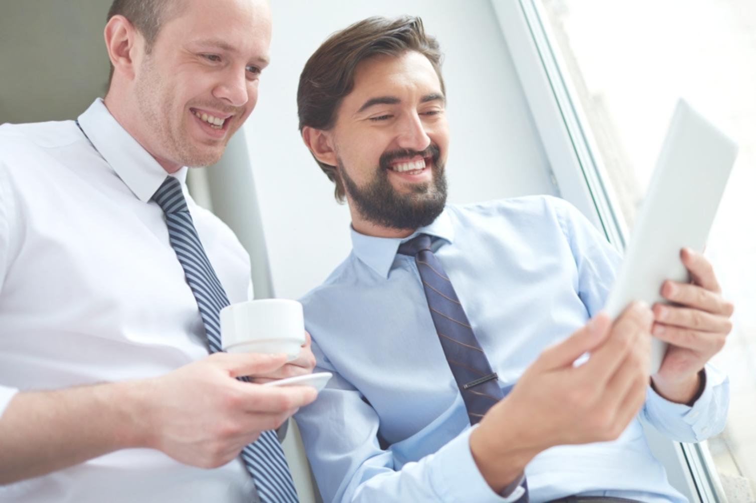 Business professionals analyzing complex financial scenarios and making strategic decisions based on modeling results